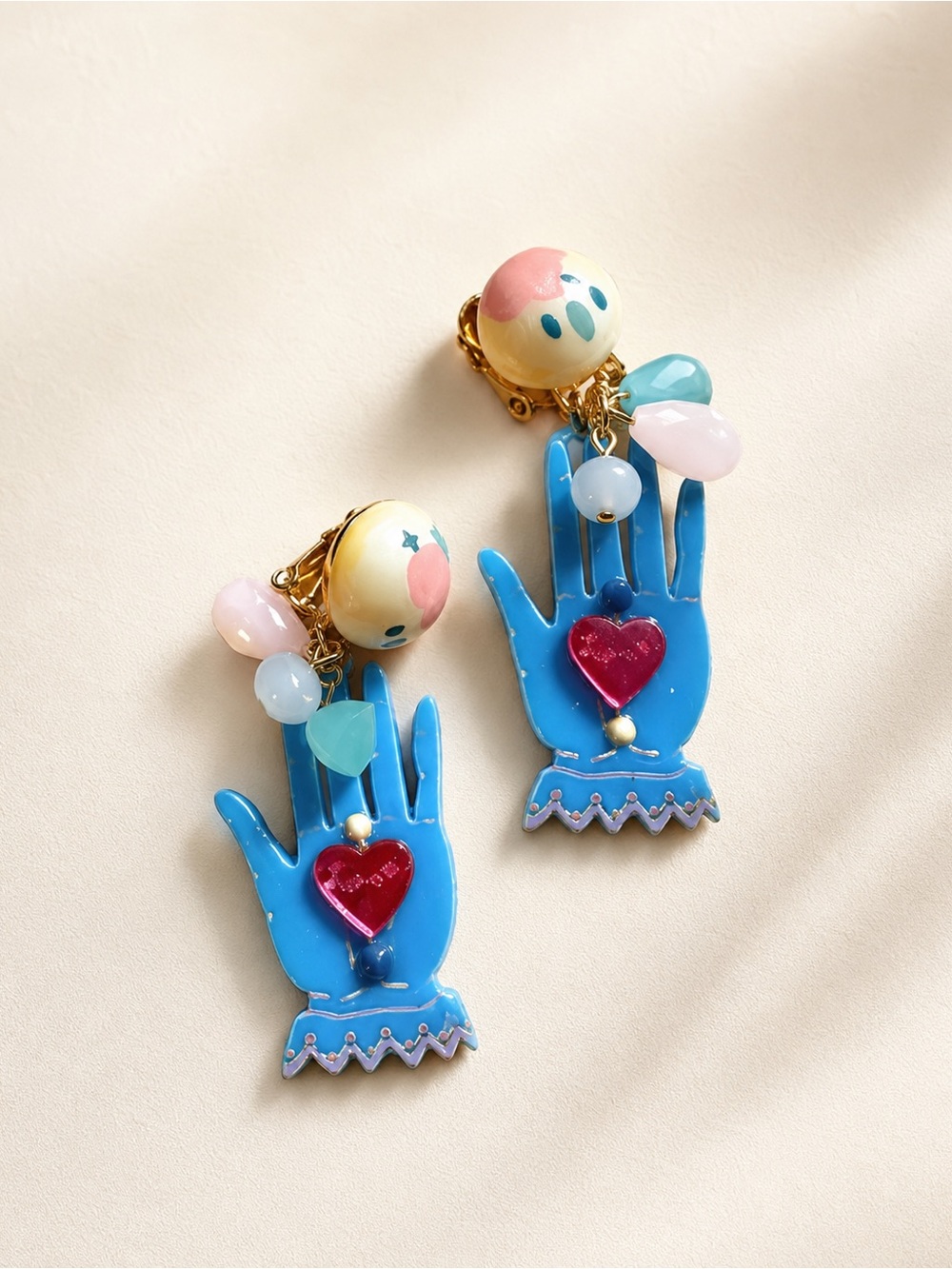 Unlogical Poem - Blue Hand Charm Clip-On Earrings with Pink Heart Accent
